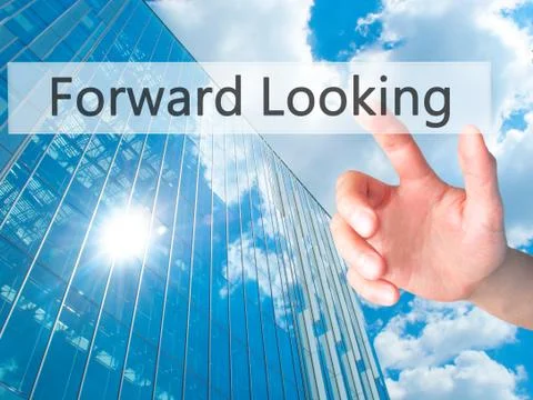 Forward Looking - Hand pressing a button on blurred background concept on vis Stock Photos