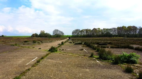 Forward motion, Aerial view of disused runway. Drone shot Stock Footage 108397989