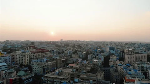 A forward motion drone shot above Hyderabad at sunset. Stock Footage 127562928