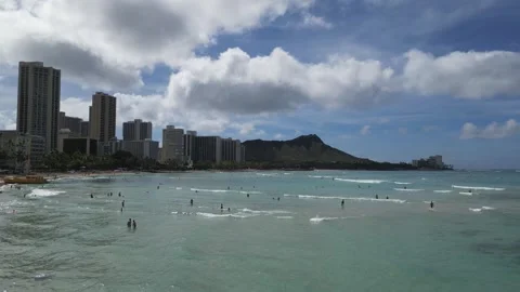 Forward motion drone shot of Waikiki and Diamond Head in Oahu Stock Footage 310213256