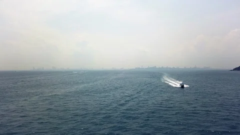 Forward motion drone view of a fast approaching speed boat over open water Stock Footage 108201679