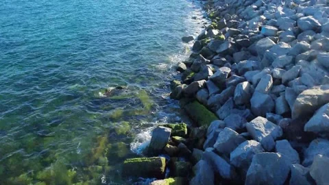 Forward Motion Over Coastal Rocks Texture Vídeo Stock 332480836