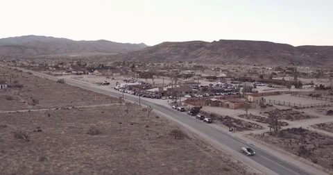 Forward Motion Shot of A Bar In The Desert With Patrons Video stock 84043059