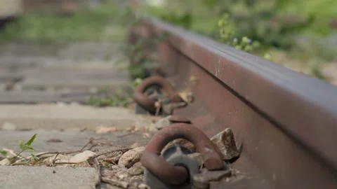 Forward Moving Close Up Along a Rusty Railway Track Stock-Footage 346758372