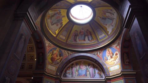 Forward moving dolly shot of of a painted chapel ceiling and skylight in Stock Footage 196449074