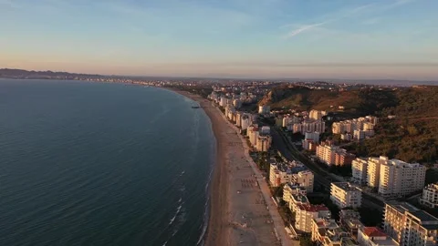 Forward-moving drone shot over Durres Beach in Albania Video stock 311055798