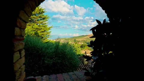 Forward moving shot from window of old farmhouse in Pineto Stock Footage 315491730