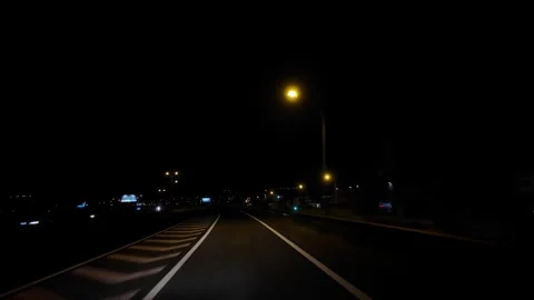 Forward moving vehicle during darkness 스톡 동영상 339712416