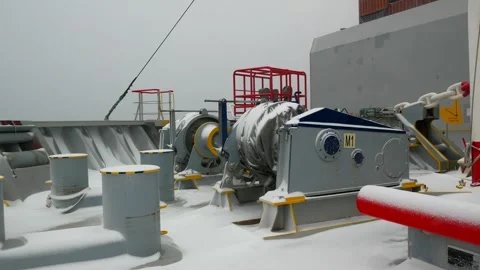 Forward part of ultra large container ship full of snow Stock Footage 244385007