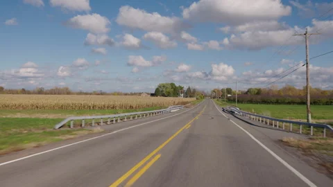 Forward POV Across Countryside Bridge and Cornfields Видео 344050460