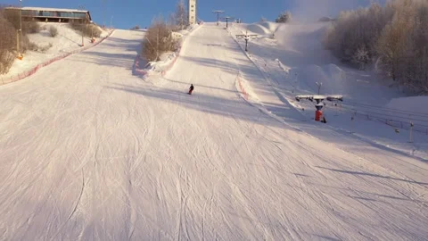 Forward rising drone view of winter ski terrain Vidéo 322641738