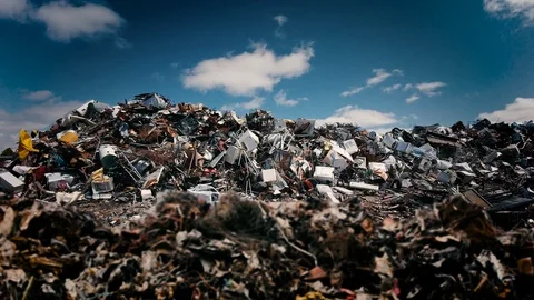 Forward shot of garbage waste dump of junky messy debris in a junkyard Stock Footage 125221202