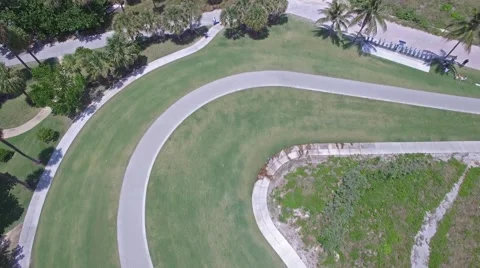 Forward Tilt Revealing Drone Shot in South Beach 4k Stock Footage 64953376