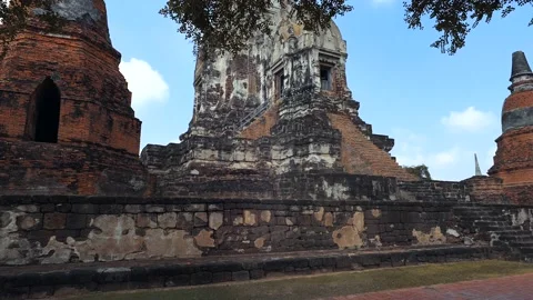 Forward &amp; tilt shot of old buddhist temple Wat Mahathat - Ayutthaya, Thailand Stock Footage 176157732