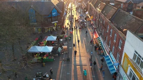FORWARD TRACK DOWN SHOT OF STREET FRUIT MARKET DURING RUSH HOUR AT SUNSET Stock-Footage 150006494