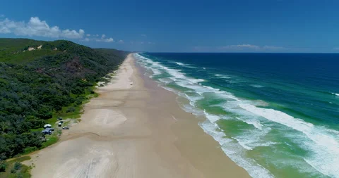 Forward tracking aerial of beach and pounding surf, Fraser Island,QLD,Australia Stock Footage 140527341