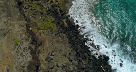 Forward tracking aerial view of Green Sand Beach,Big Island,Hawaii,usa Stock Footage 120715526