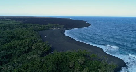 Forward tracking Aerial view of Pohoiki Black Sand Beach,Big Island,Hawaii,usa Video stock 120916634