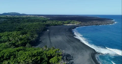 Forward tracking Aerial view of Pohoiki Black Sand Beach,Big Island,Hawaii,usa Video stock 120934724