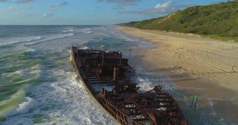 Forward tracking low angle view of SS Maheno shipwreck, Fraser Island,QLD Stock Footage 140697453