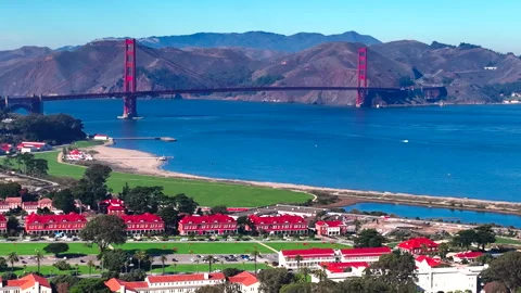 Forward tracking of San Francisco bridge with city and greenery Stock Footage 336792912