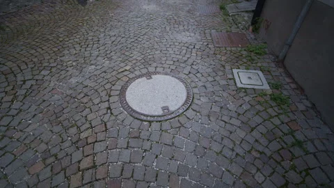 Forward Tracking Shot Above Curved Cobblestone Street Texture Stock Footage 327175960