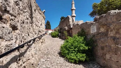 Forward Tracking Shot along Ancient Cobblestone Alley Stock Footage 340575947