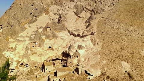 Forward tracking shot of cave houses Stock Footage 237144783