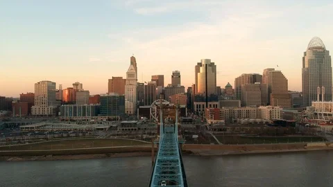 Forward tracking shot over Roebling bridge toward Cincinnati skyline Stock Footage 100416529