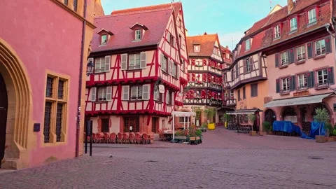 Forward tracking shot through empty historic main square in Colmar, 4K Stock Footage 340846328