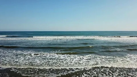 Forward tracking shot of water's edge Stock Footage 82514968