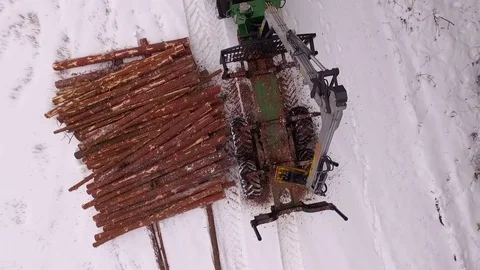 Forwarder in the beautiful winter forest Stock Footage 70705739