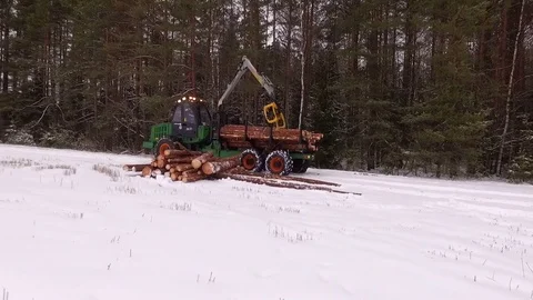 Forwarder working in winter Stock Footage 70706010