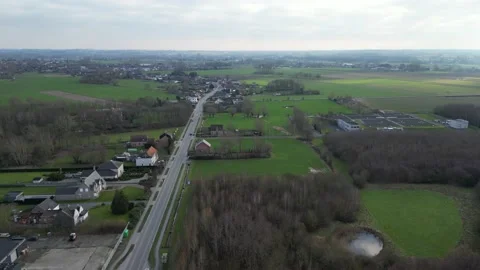 Forwards drone aerial main road connecting villages countryside rural europe Stock Footage 233295950