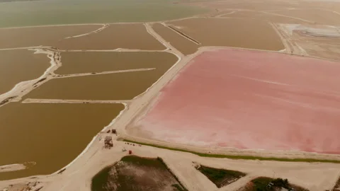 Forwards fly above system of ponds for salt extraction. Peculiar colours due to Stock Footage 164300010