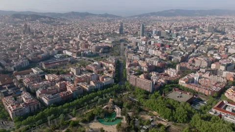 Forwards fly high above metropolis. Parc de la Ciutadella with fountain and Video stock 244683250