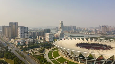 Foshan traffic street opera cube tower stadium aerial timelapse 4k china Vídeo Stock 124640025