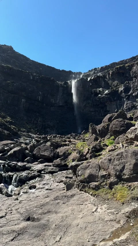 Fossa waterfall the highest waterfall in Faroe Islands cascading 140 meters down Stock Footage 331252756
