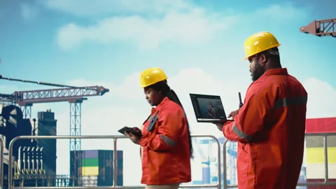 Fossil fuel company expert using laptop software Stock Footage 319974054