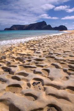 Fossil sand on the beach Stock Photos