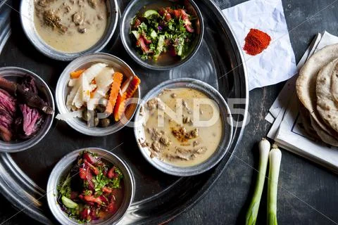 Foul (bean dish, Egypt) with salads Stock Photos