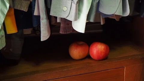 Found apples in the wardrobe. It found often if you be with Alzheimer's disea Stock Footage 111570427