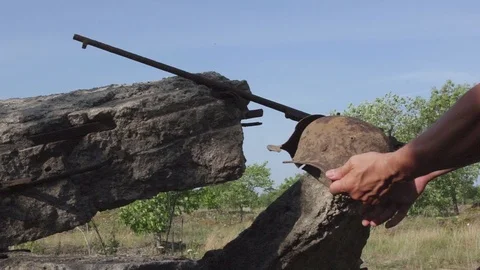 Found a German bayonet, and a rusty rifle. Stock Footage 95228745