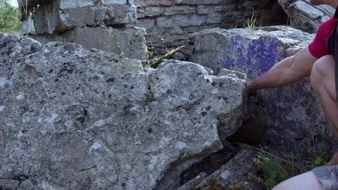 Found a German bayonet, and a rusty rifle. Stock Footage 95229060