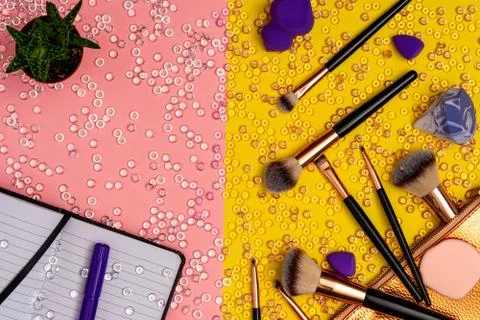 Foundation brushes with notebook and marker, flat lay Stock Photos