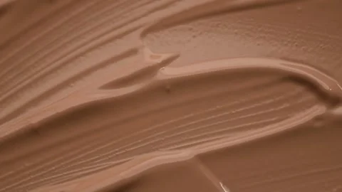 Foundation, concealer, face makeup smudge, smears background Cosmetic liquid Stock Footage 320083087