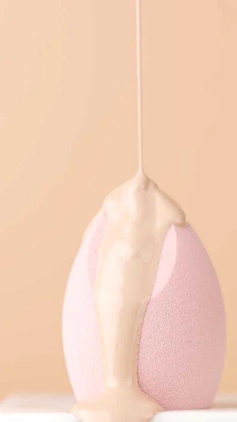 Foundation for face flowing down on sponge. Stock Footage 304993167