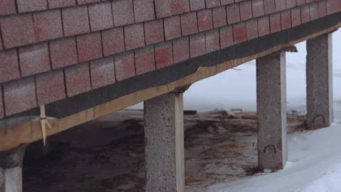 Foundation of a frame house, piles of a private house Stock Footage 234008795