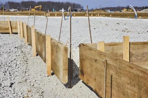 Foundation Framework at Suburban Construction Site, Daytime Perspective Stock Photos