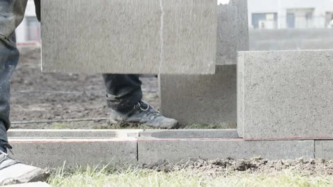 The foundation of the house is made of concrete blocks bound with metal armature Stock Footage 237451485